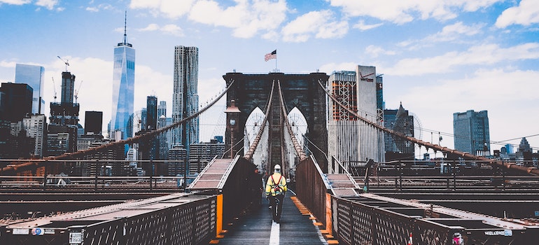 Man walking on the Brooklyn Bridge