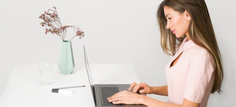 woman searching what's better Tribeca or Clinton for your office relocation