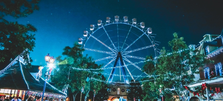 An amusement park at night as one of the top things to do in NYC in spring 2023.