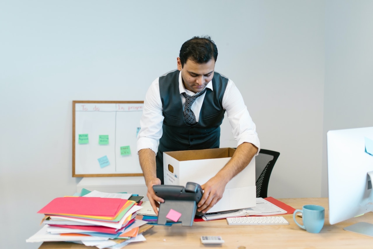 a man packing his office stuff